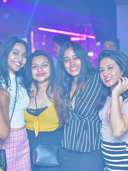 A snapshot of the crowd at Simon Says Brew Works during one of my Forbidden Fridays events. The purple and blue club lighting creates a great atmosphere for a night of dance music.