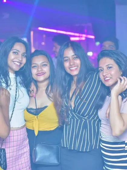 A snapshot of the crowd at Simon Says Brew Works during one of my Forbidden Fridays events. The purple and blue club lighting creates a great atmosphere for a night of dance music.