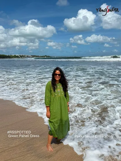 Our customer Archana wears the green Paheli dress on the beach. This piece, with its soft cotton and relaxed fit, is designed to move with you, from beach walks to dinner plans.