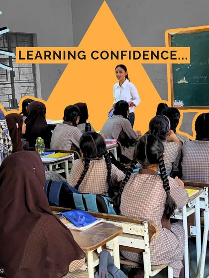 A teacher watches with a smile as her students participate in our music workshop. Seeing the positive impact on both students and teachers is one of the most rewarding parts of our work.