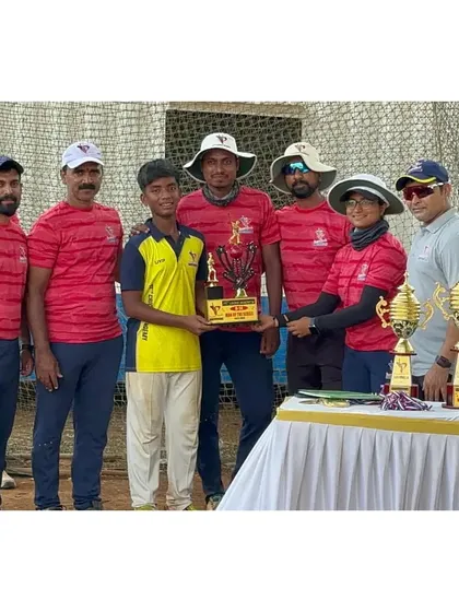 The U-14 Man of the Series, Asad Ali, is honored by the coaching staff for his incredible tournament statistics.