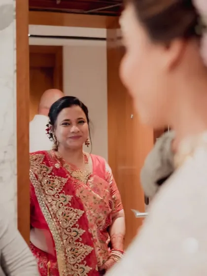A mother's loving gaze as she sees her daughter ready as a bride. These are the emotional memories we help create.