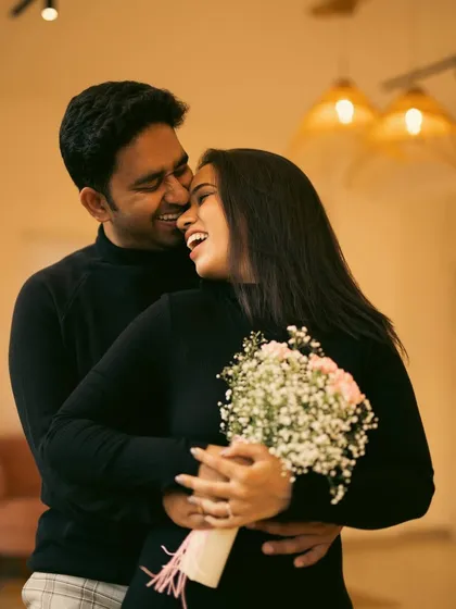 In our Bangalore studio, we create a relaxed space where you can just be yourselves. This candid shot, full of laughter and warmth, is a perfect example of how we capture your natural connection without any awkward posing.