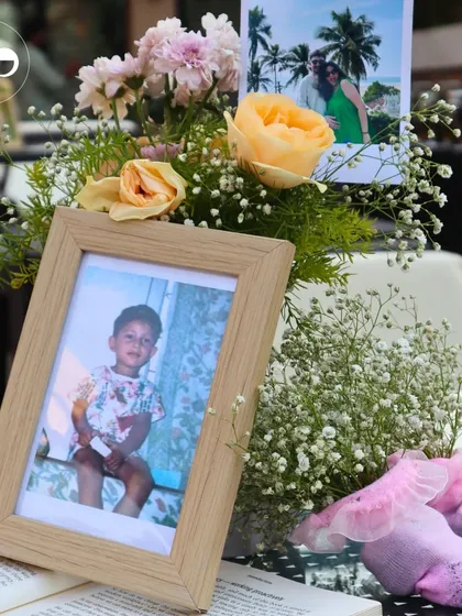 A childhood photo of one of the parents-to-be adds a nostalgic and sweet touch to the decor.