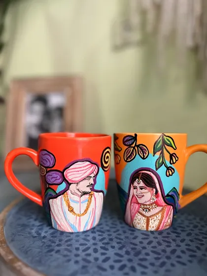 The perfect mug to gift your newlywed friends, featuring portraits of the bride and groom in their wedding attire.