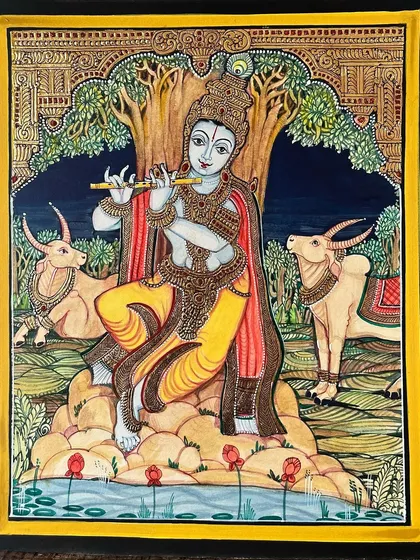 A beautiful painting of Lord Krishna playing his flute, surrounded by his beloved cows. This is part of our accessible 10x12 inch size range.