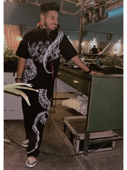 I don't do boring outfits. Here I am rocking a cool co-ord set from Gen Rage before a gig. My look is part of the performance.