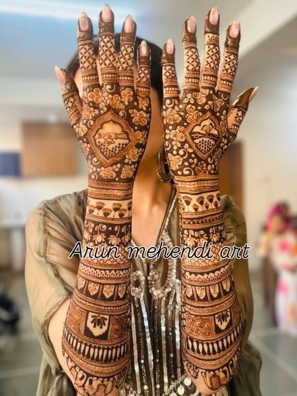 A full-arm design focused on beautiful, repeating patterns. The symmetry and detail make this a timeless and elegant choice.