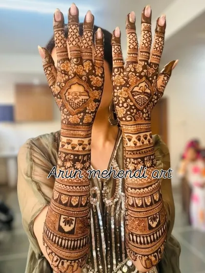 A full-arm design focused on beautiful, repeating patterns. The symmetry and detail make this a timeless and elegant choice.