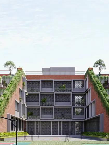 A view of the central courtyard and terraced green steps of the MG Suncity School in Chhattisgarh. The design aims to connect students with nature as part of their daily learning experience.