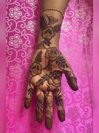 A bold floral vine design, perfect for someone who wants a striking but not overly dense pattern. The thick lines create a beautiful contrast on the skin.