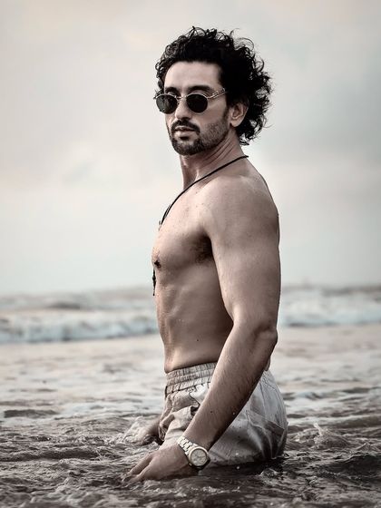A powerful outdoor portrait of actor Shaad Randhawa. Shooting on location, like this beach session, can add a completely different mood and energy to a branding portfolio.