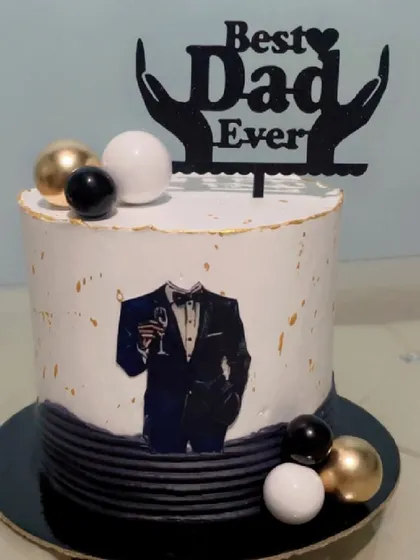 Show your appreciation for the "Best Dad Ever" with this stylish cake. It features a tuxedo design, a classy black, white, and gold colour scheme, and a heartfelt topper to celebrate your dad in style.