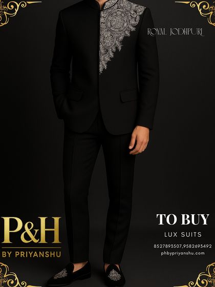 A full-length shot of the black Jodhpuri suit, paired with embroidered loafers. This view showcases the complete, cohesive look and its sleek, modern silhouette.