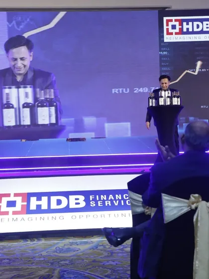 Performing a production illusion for HDB Financial Services. This act is about creating abundance from nothing, a fitting theme for a financial celebration.
