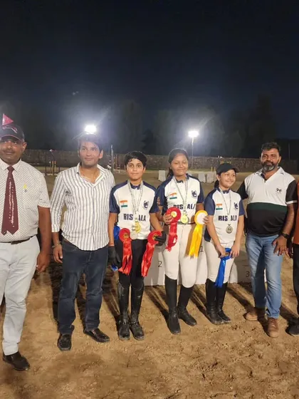 The team celebrating together after a successful competition at the Verdinand Horse Show. We compete as a team and we win as a team.