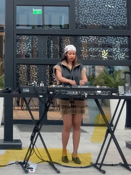 A full length view of my DJ setup and outfit for a sunny afternoon session.