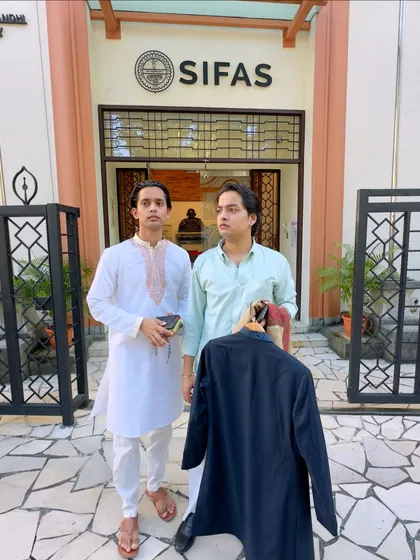 A candid moment outside the SIFAS building in Singapore with my brother. We were trying to be tourists before our concert.