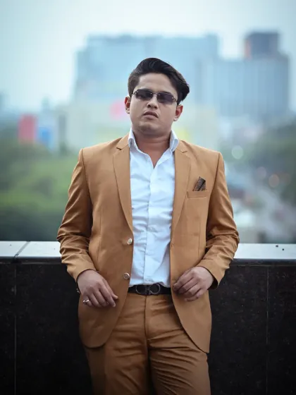 This close-up portrait was taken during an outdoor session in Delhi NCR. The goal was to create a confident and modern look for a personal branding portfolio, using the city skyline as a subtle backdrop.