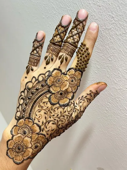 The other hand with a matching semi bridal floral design, showing the complete, balanced look.