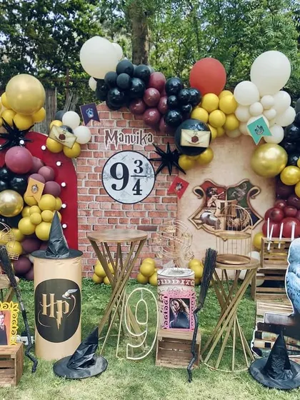 For the little wizard in your life, this Harry Potter theme is pure magic. I created a Platform 9 3/4 backdrop, complete with the Hogwarts crest, sorting hats, and even Hedwig, perfect for an outdoor party at home.
