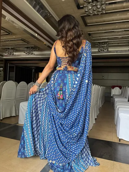 A look at the back of the Navratri lehenga, showing how the hairstyle and overall styling create a complete, head-to-toe look.