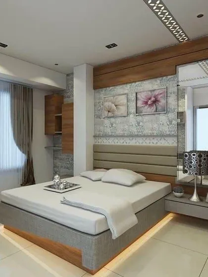 A cozy and compact bedroom design that maximizes space. The floating nightstand, full-length mirror, and under-bed lighting make the room feel larger and more open.