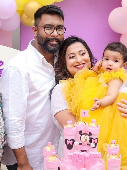 A vibrant 'Rainbow' themed birthday party, featuring a spectrum of colors in balloons, backdrops, and decorations, creating a cheerful and festive atmosphere.