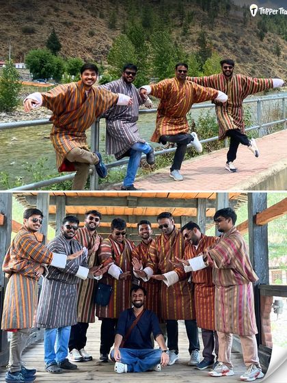 The boys of the group having fun and striking a pose in traditional Bhutanese Gho. It's moments of pure fun and cultural immersion like this that define our trips.