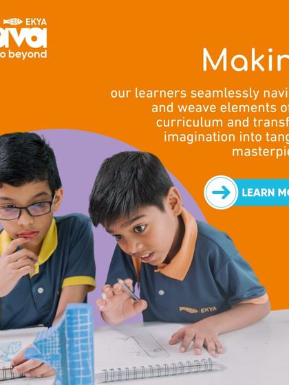 In my Making Pathway, I guide learners to weave elements of the curriculum into tangible masterpieces. These students are focused on a construction project, demonstrating how imagination is transformed into reality.