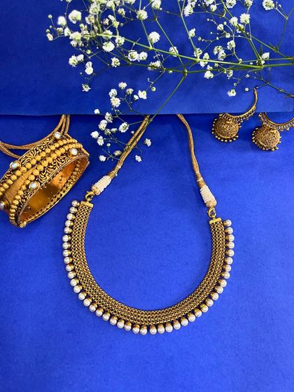 The Radiance of Gold: Traditional Necklaces & Bangles photo 5