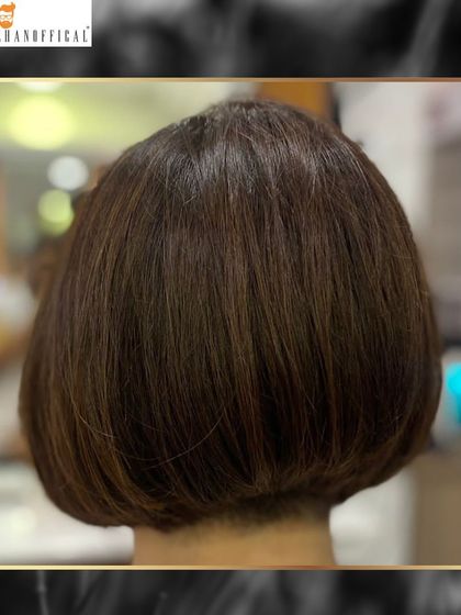 The back view of a classic bob, showcasing the clean lines and precision of the cut. A great bob holds its shape and style.