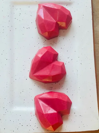 These mini geometric heart cakes are a perfect, modern treat for Valentine's Day. Each one is a small bite of love, ideal for gifting or sharing with someone special.