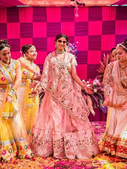 The bride's solo moment during her Haldi ceremony. Even in a fun, daytime event, we create moments for the bride to be the center of attention.