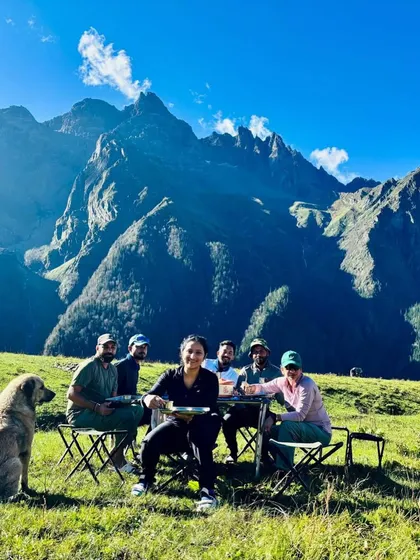 Lunch with a view on the Buran Ghati trek. We make sure you're well-fed with simple, hot meals even in the most remote locations.