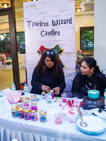 A "Timeless Wizard Candles" activity station where guests could create their own magical, themed candles to take home as a party favor.