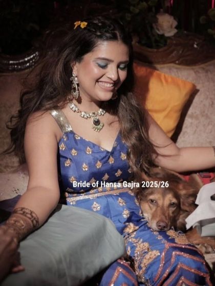 A sweet moment between the bride and her dog during her mehendi. It's a beautiful reminder that love comes in all forms and that our pets are part of our family.