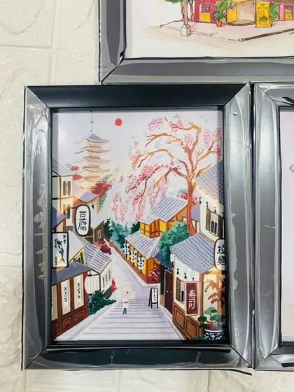 A detailed illustration of a Japanese street scene with cherry blossoms, set within a stylish frame. This piece highlights my ability to work with intricate details and vibrant colors.