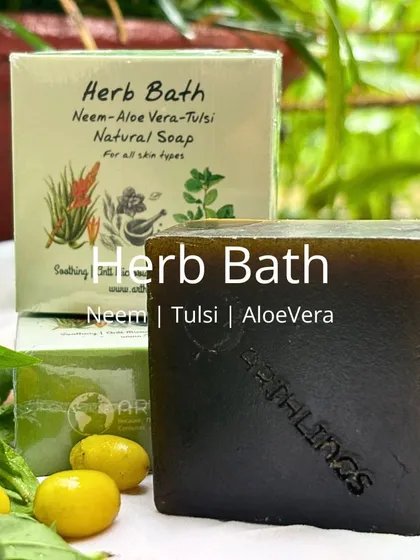 Our Herb Bath Soap, featuring a powerful trio of Neem, Tulsi, and Aloe Vera. This natural soap is soothing and suitable for all skin types.