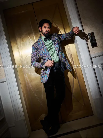 Ankush Bahuguna strikes a pose in our multi-hued jacket, a perfect balance of casual and sophisticated style. The cool tones and detailed print add a refined touch to everyday wear.