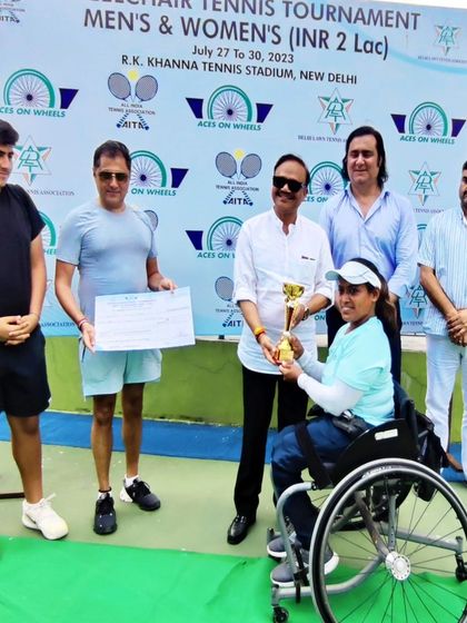 Another angle from the DLTA Wheelchair Tennis Tournament awards ceremony, capturing the pride and accomplishment of our singles winner. These moments fuel our collective drive for excellence.