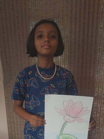 Another student's beautiful rendition of a lotus, showcasing her clean lines and soft coloring.