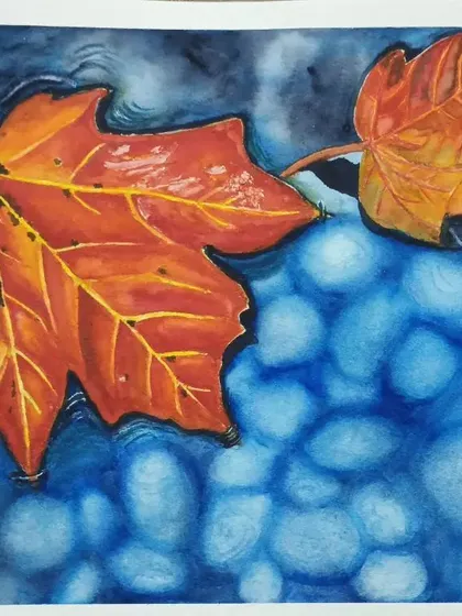 This painting of autumn leaves floating on water is titled 'Whispers of Fall'. I created this piece in a class with my own teacher, Anu, as I believe in being a lifelong learner.