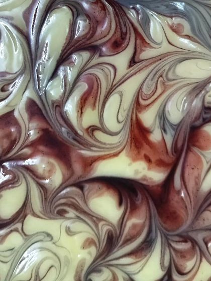 The magic of natural colorants. This is the batter for my Lush Lavender soap, colored with Alkanet Root, which creates these beautiful, deep purple and reddish swirls.