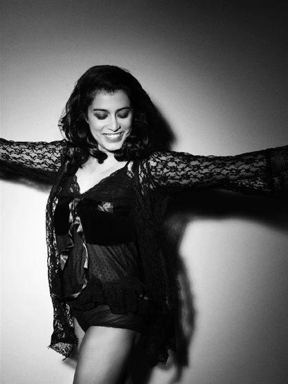 A candid black and white shot filled with laughter and movement. It’s a celebration of joy in its purest form.