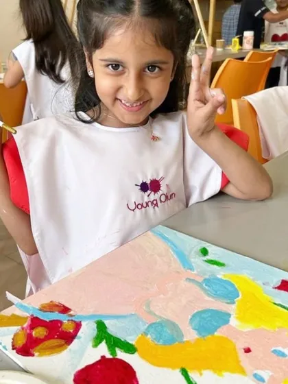Peace, love, and paint! This birthday girl is having the time of her life at her art party. I provide customized aprons and all the supplies for a stress-free, creative celebration.