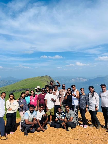 The team at the summit of Netravathi, celebrating their successful climb together.