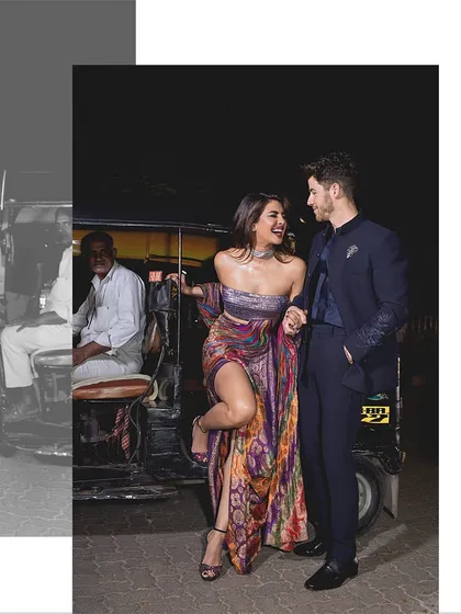 A creative composition from the Priyanka Chopra and Nick Jonas shoot, playing with monochrome and color to tell a story. This format allows for a dynamic visual narrative within a single frame.