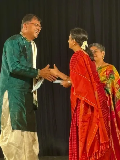 A photo of my music composer, T.V. Ramprasad, being felicitated after the premiere of "Sharad". His soulful music was the backbone of the entire production.