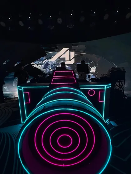A unique perspective of my DJ console, designed to look like a futuristic cannon. The neon pink and blue lights give a glimpse of the high tech aesthetic I bring to my events.